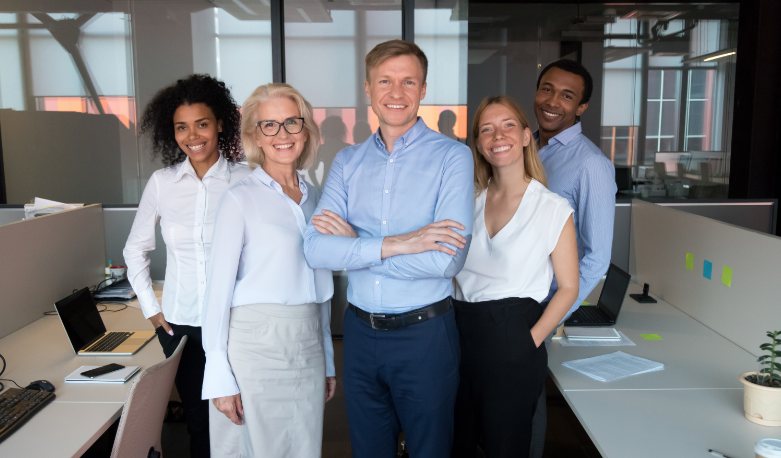 motivated-multiethnic-work-team-posing-picture-together (1)